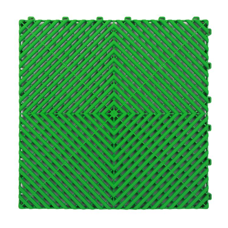 Green box of Xtreme Garage Floor Tile
